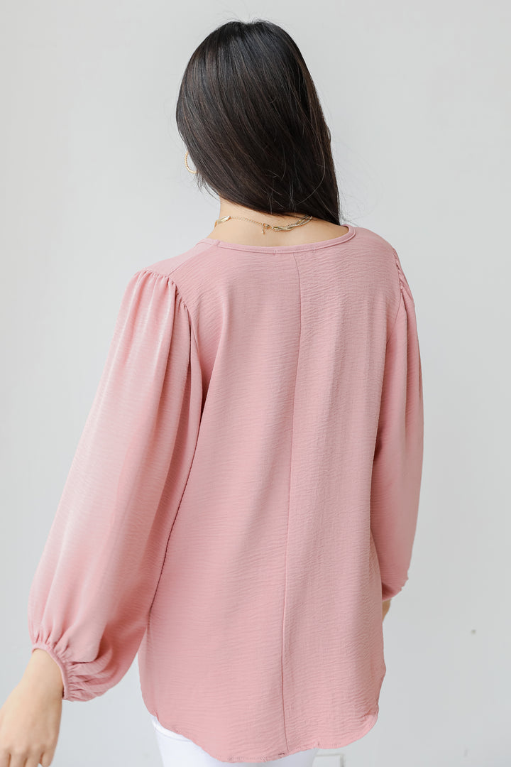 Blouse in mauve back view