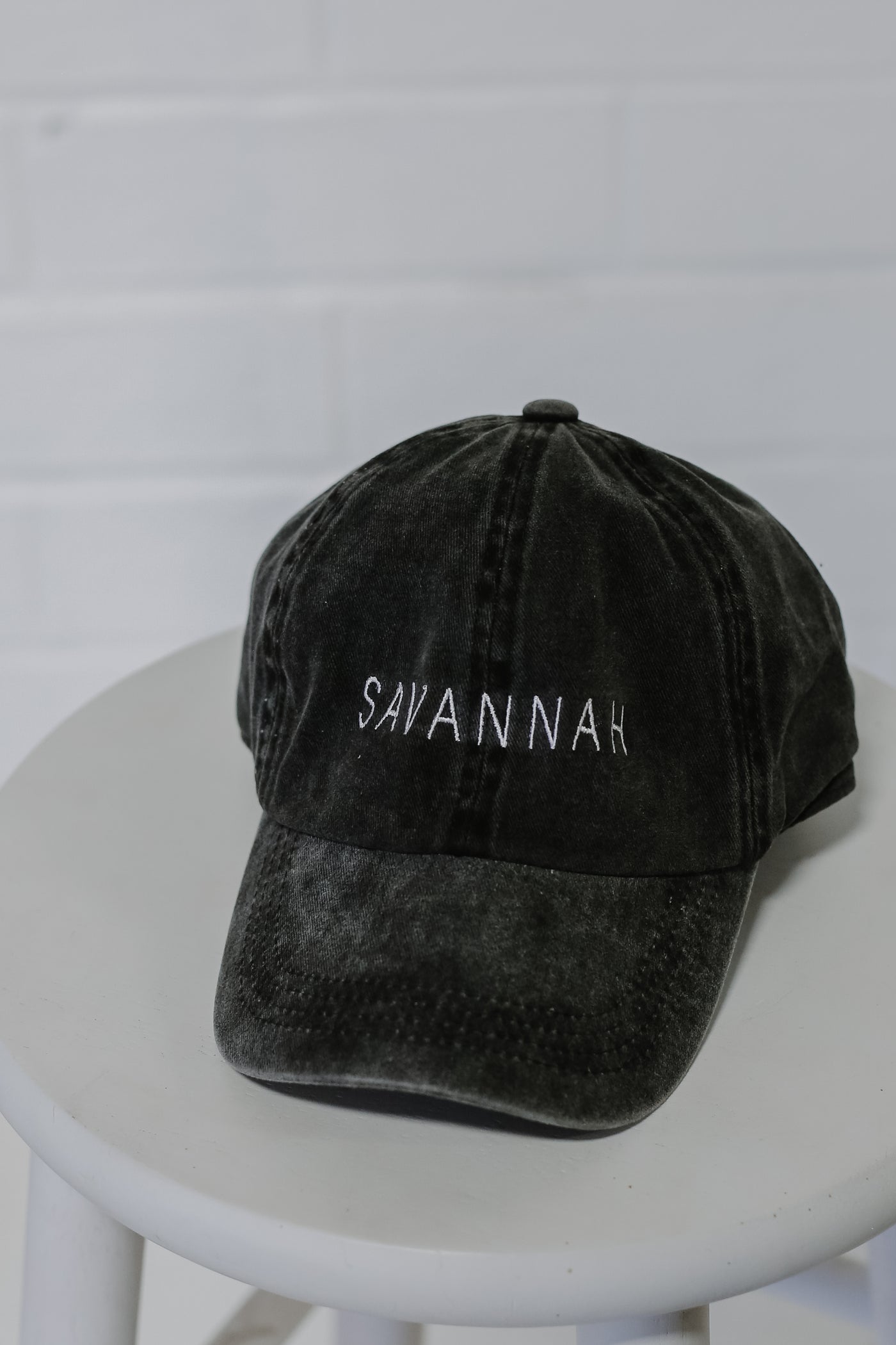 Savannah Embroidered Hat in black flat lay