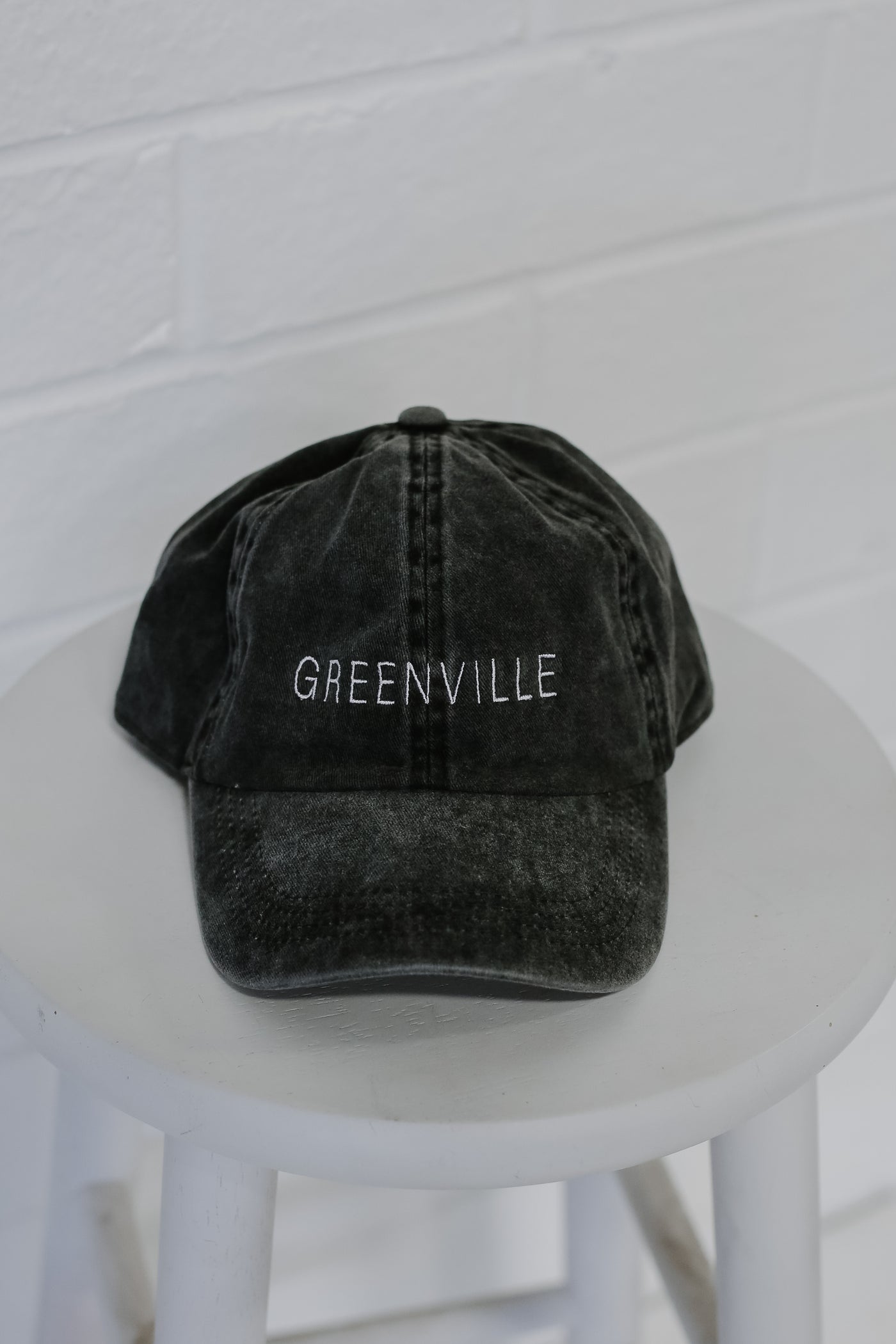 Greenville Embroidered Hat in black flat lay