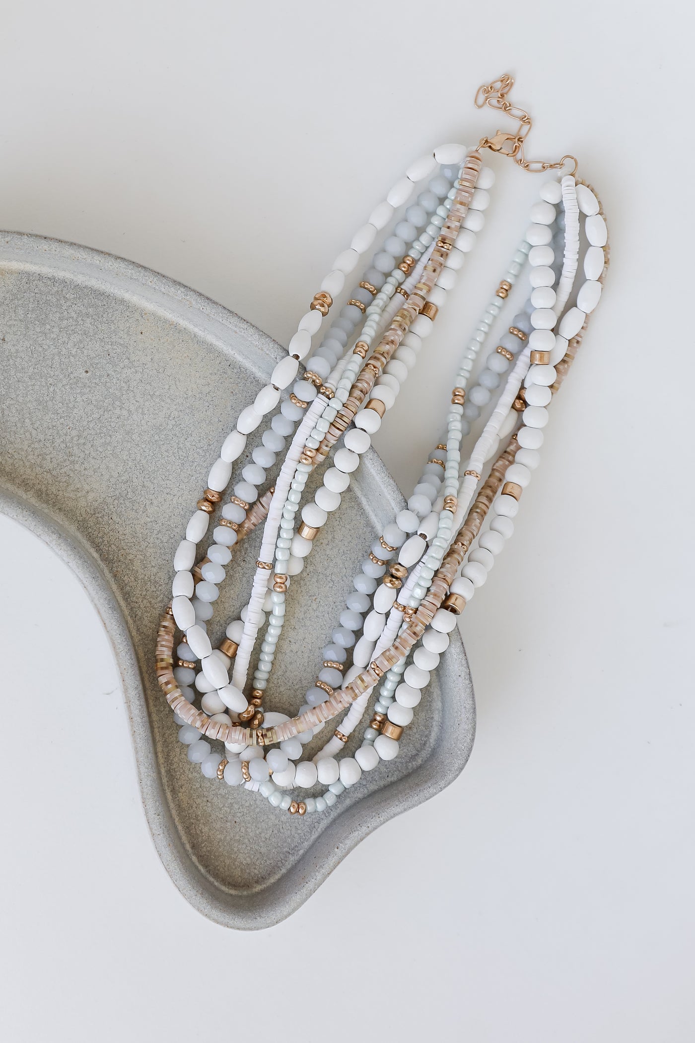 white Beaded Layered Necklace flat lay