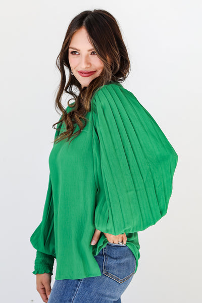 green pleated sleeve blouse side view