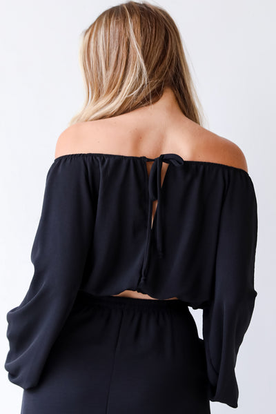 black off the shoulder blouse back view