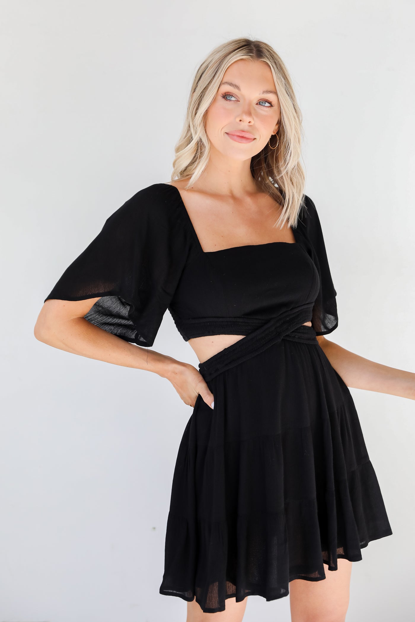 black Cutout Mini Dress on model