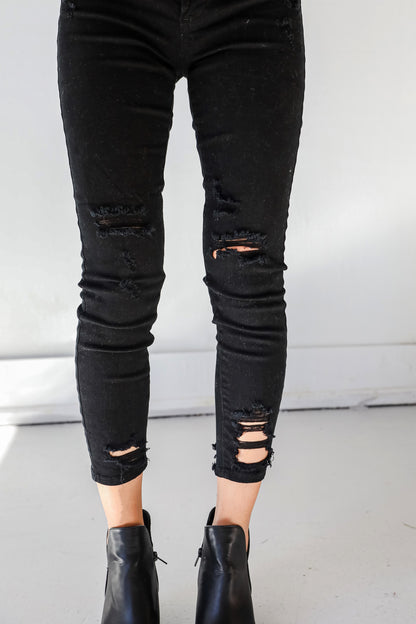 Distressed Black Skinny Jeans close up