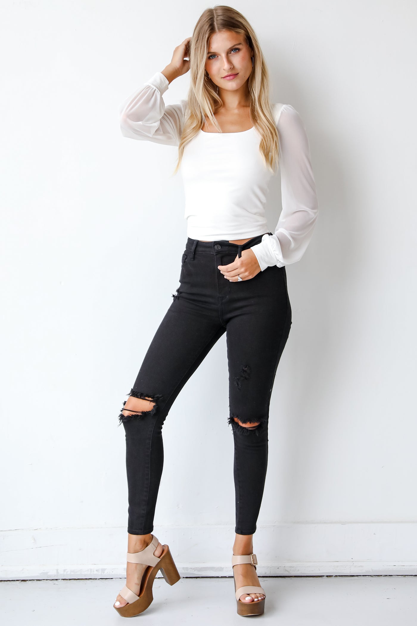 Black Distressed Skinny Jeans on model