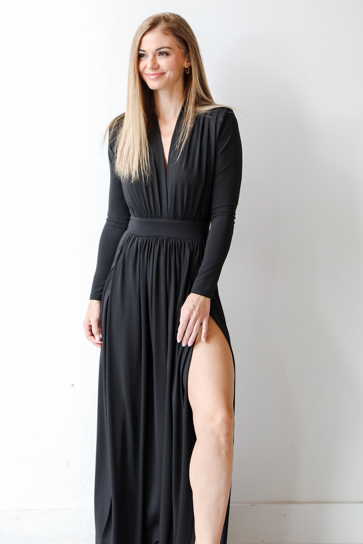 model wearing a black maxi dress