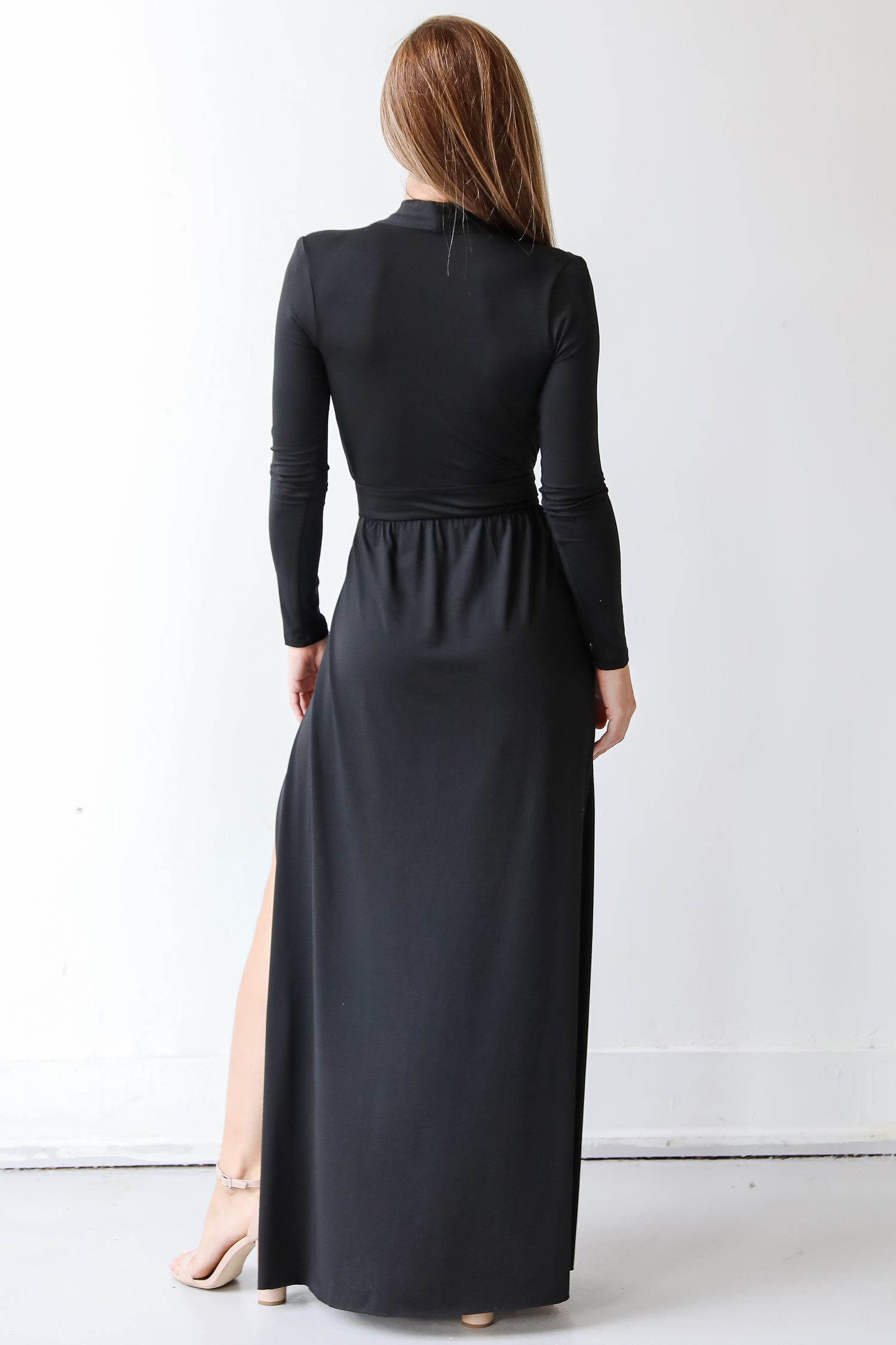 back view of a black maxi dress