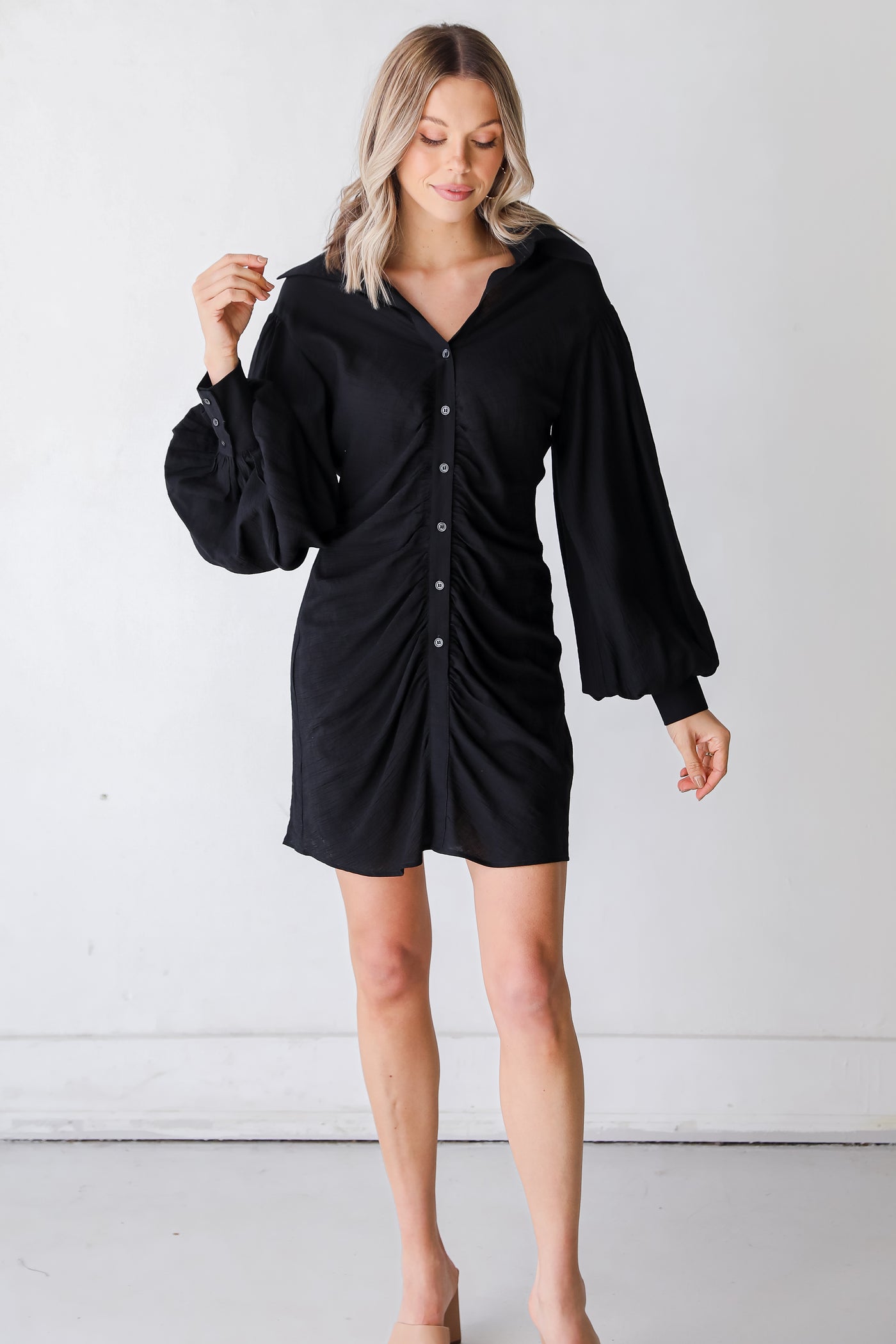 black Ruched Mini Dress on model