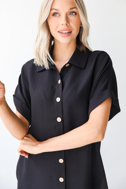 black shirt dress close up