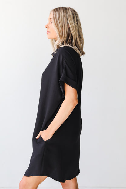 black shirt dress side view