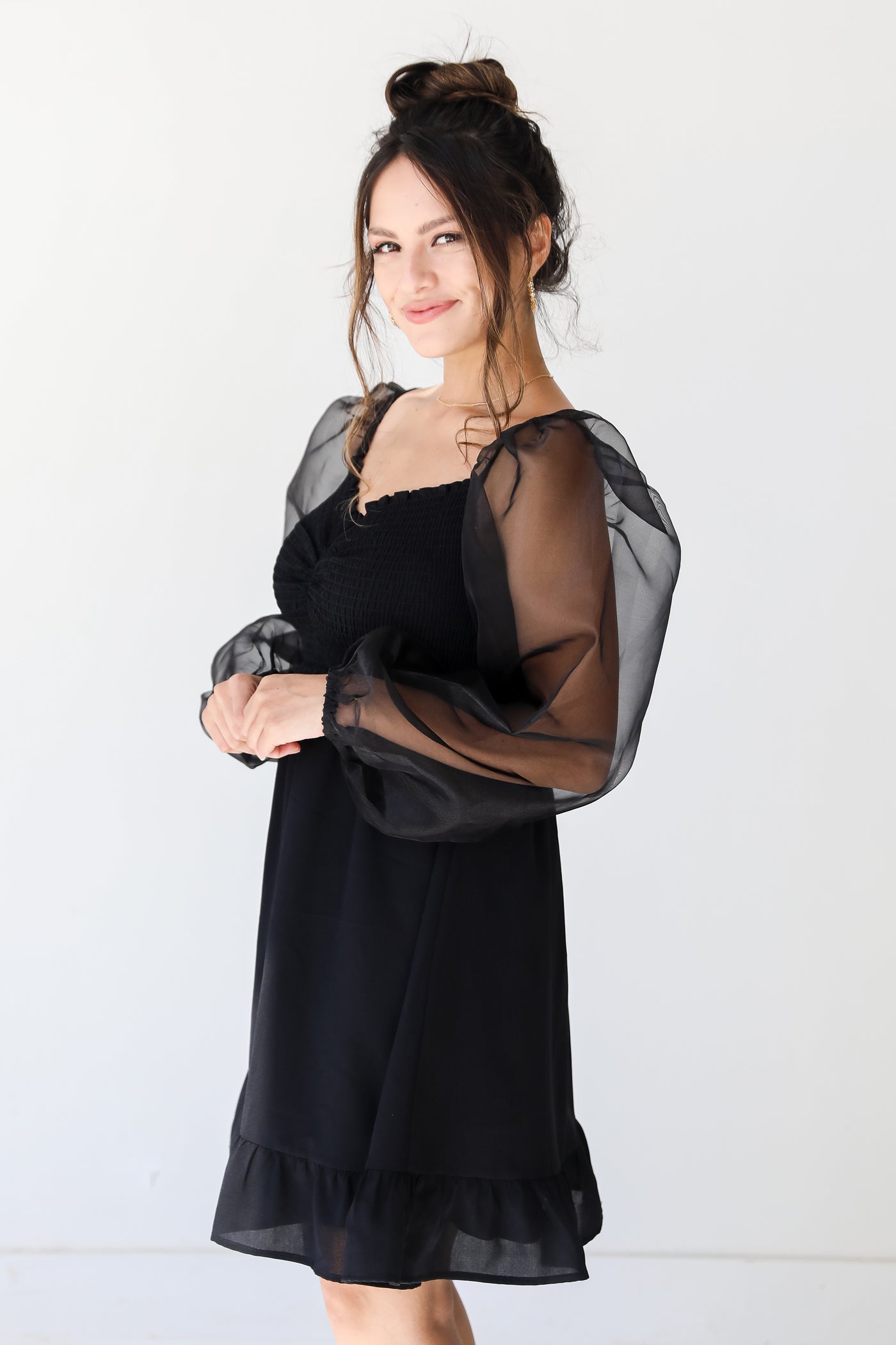black mesh sleeve mini dress side view