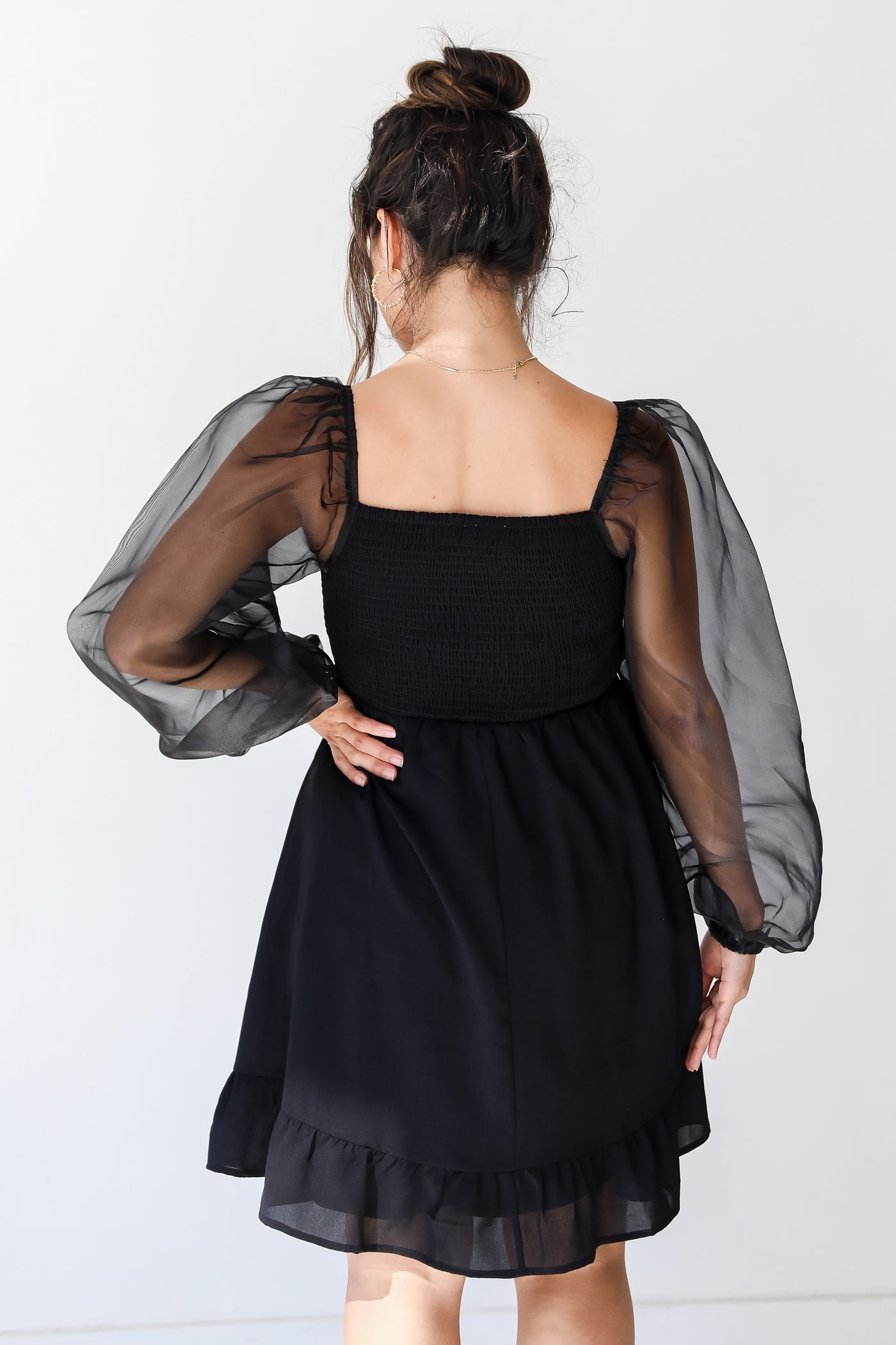 black mesh sleeve mini dress back view