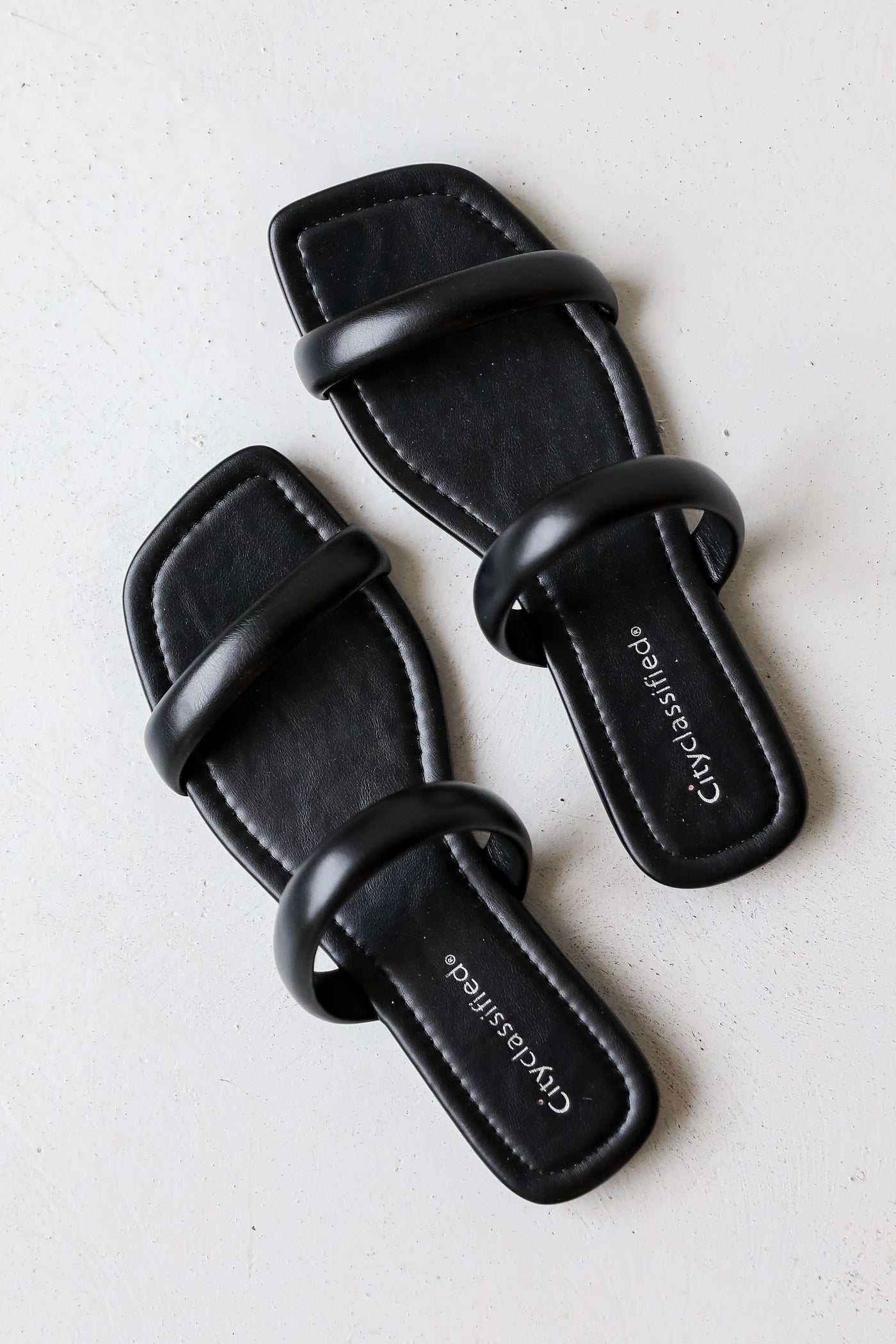 black Double Strap Sandals flat lay