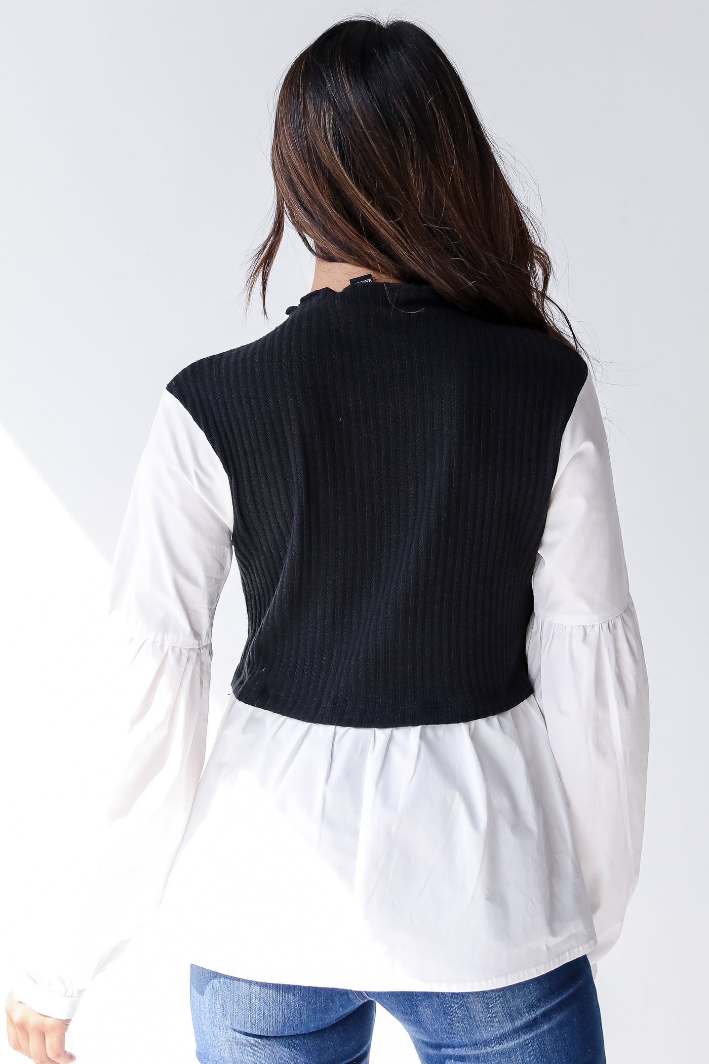 sweater vest blouse back view