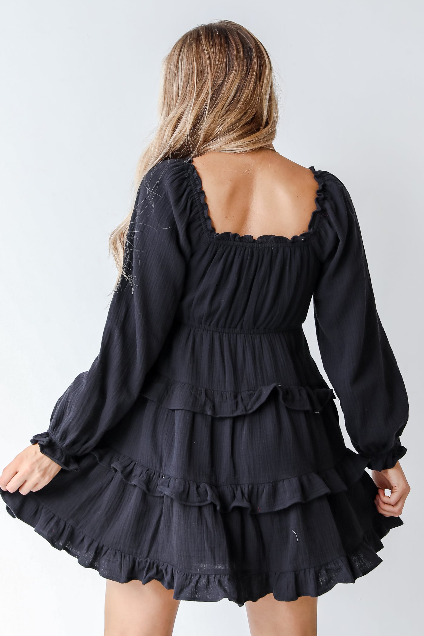 black tiered dress back view