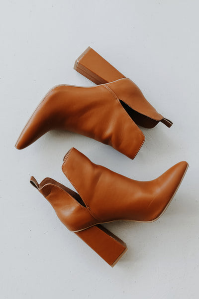 Ankle Booties in camel flat lay