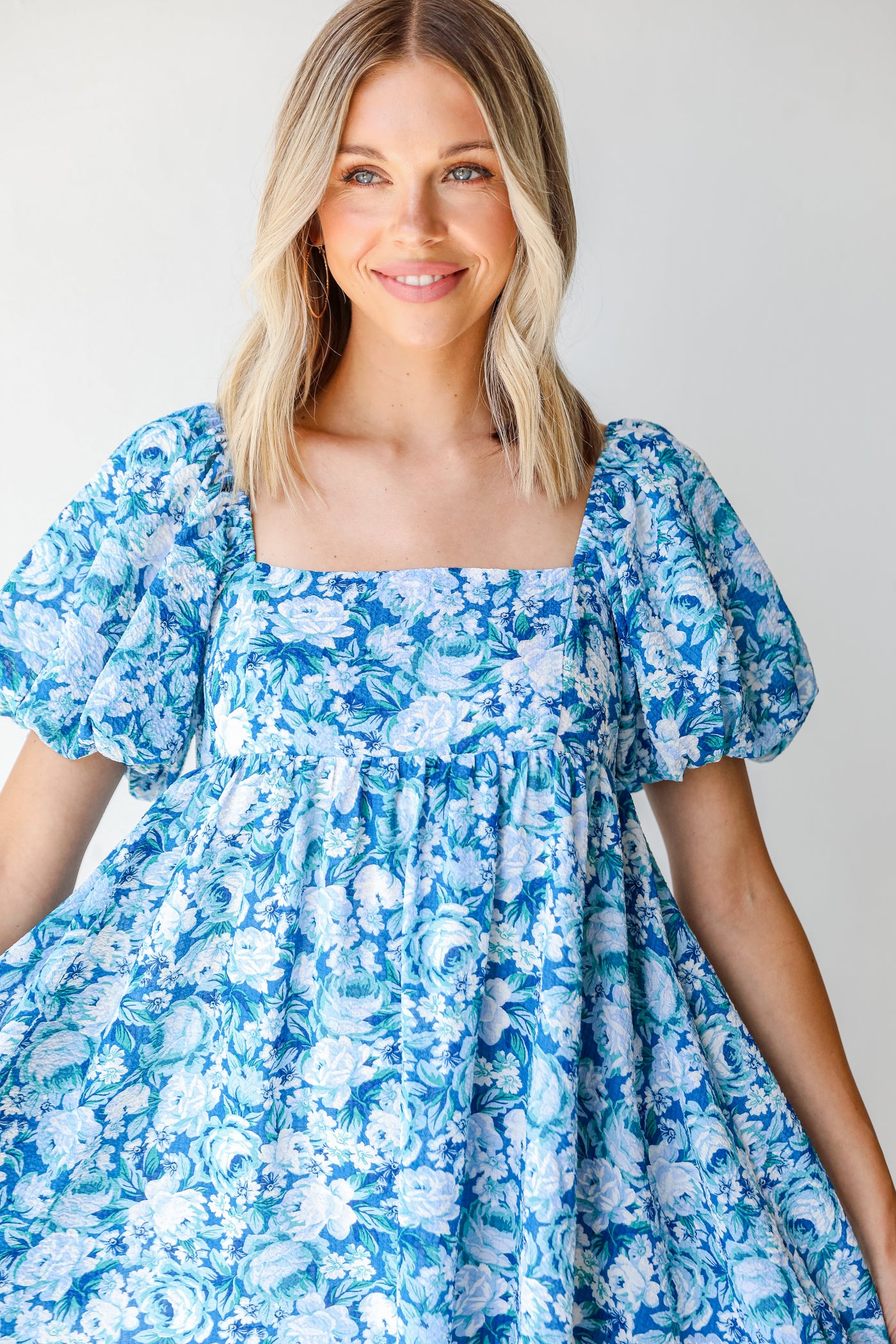 Floral Babydoll Mini Dress in blue close up
