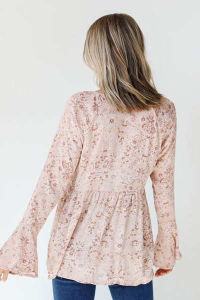 back view of a floral blouse
