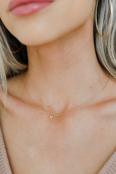 model wearing a Gold Rhinestone Butterfly Necklace