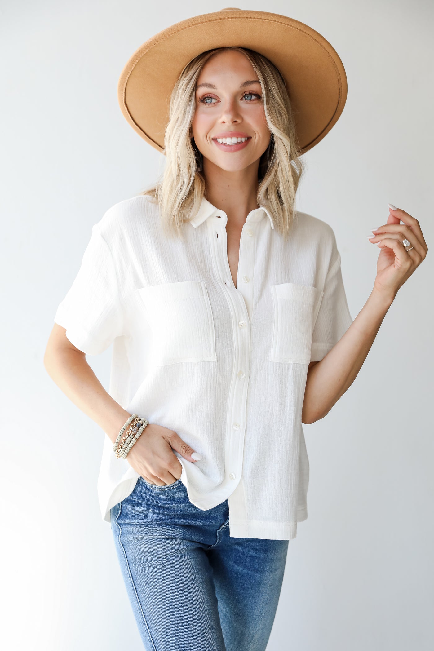 Linen Button-Up Blouse in white on model