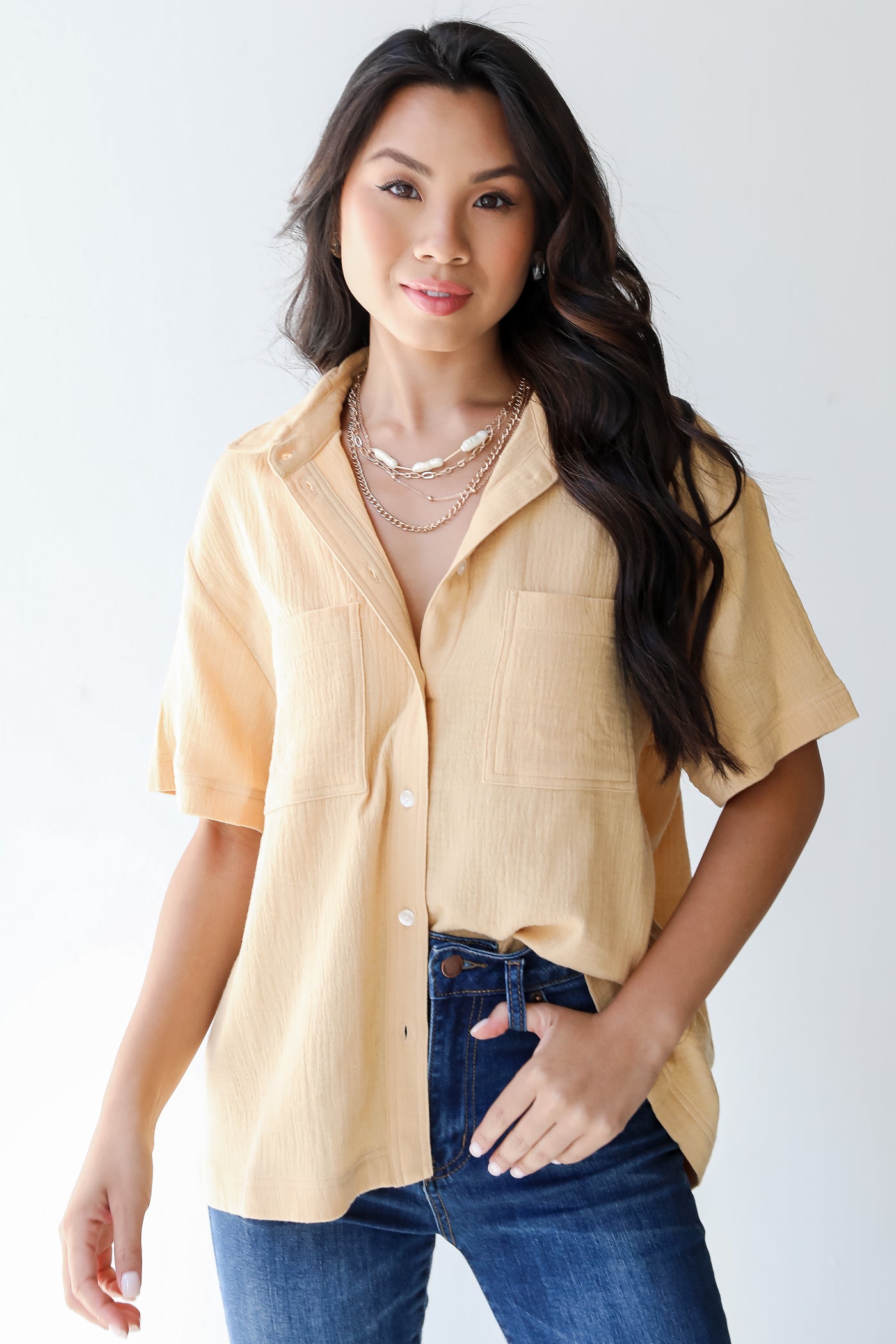 Linen Button-Up Blouse in mustard on model