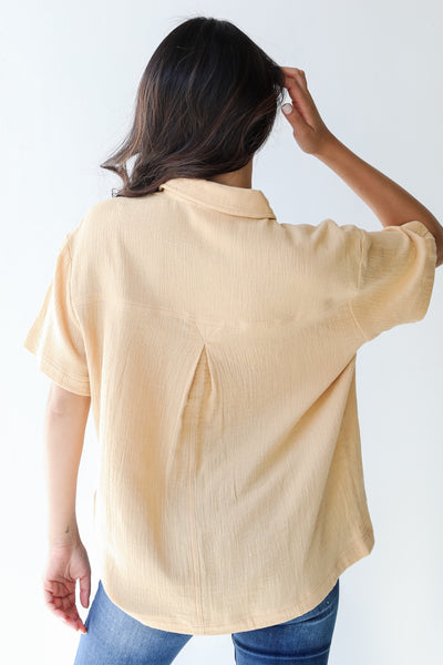 Linen Button-Up Blouse in mustard back view