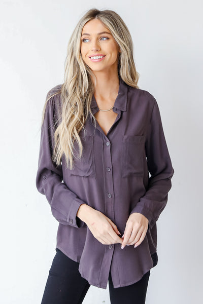 model wearing a Button-Up Blouse