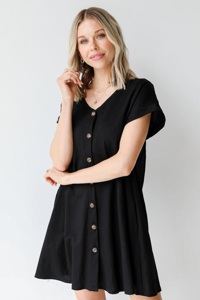Button Front Mini Dress in black on model
