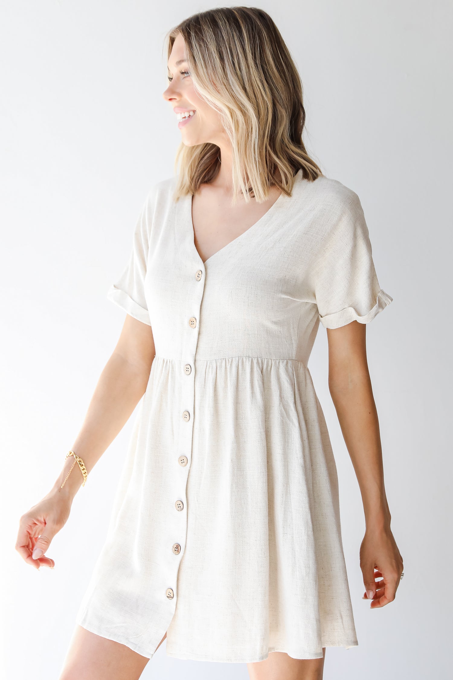 Linen Babydoll Dress in oatmeal side view