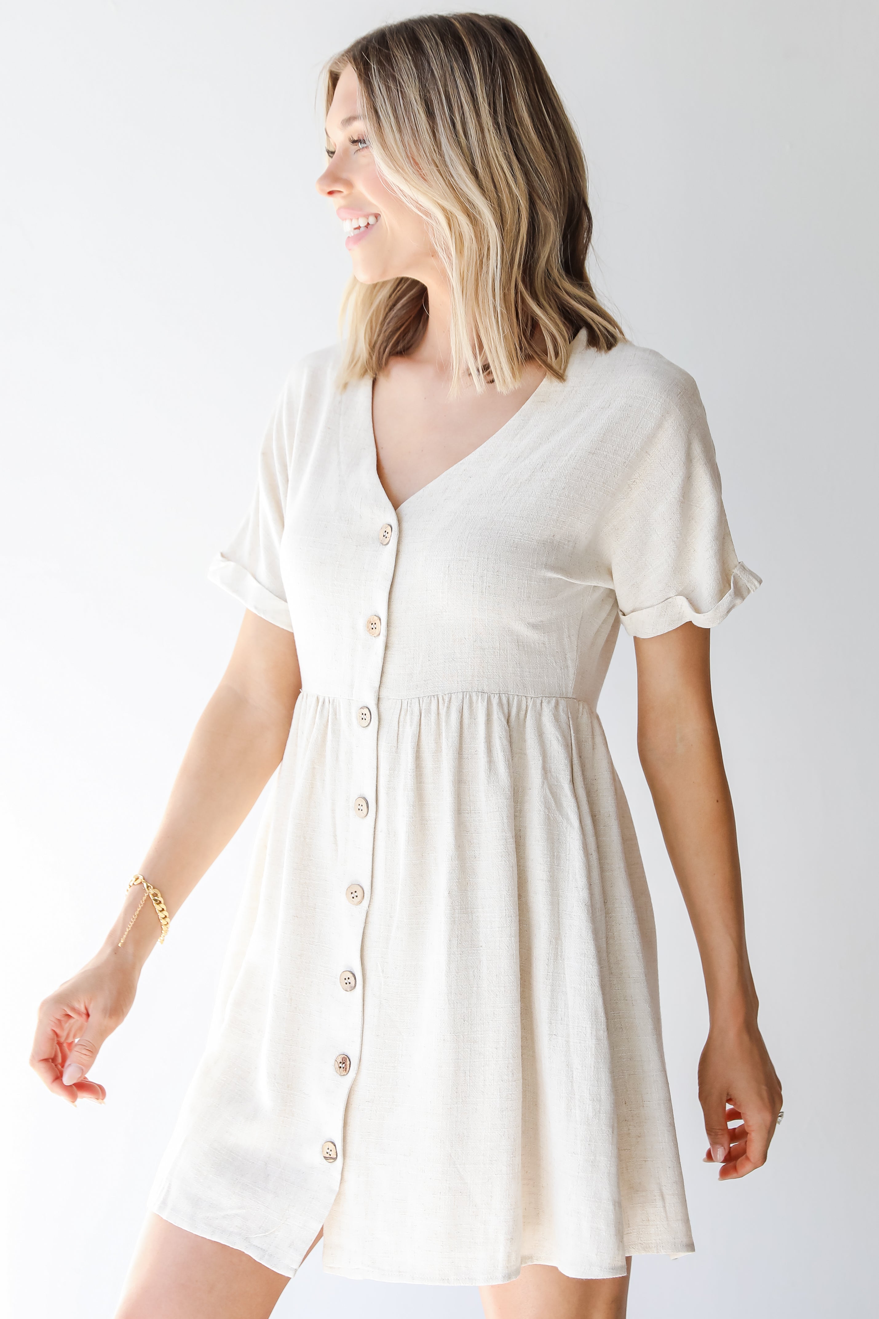 Linen Babydoll Dress in oatmeal side view