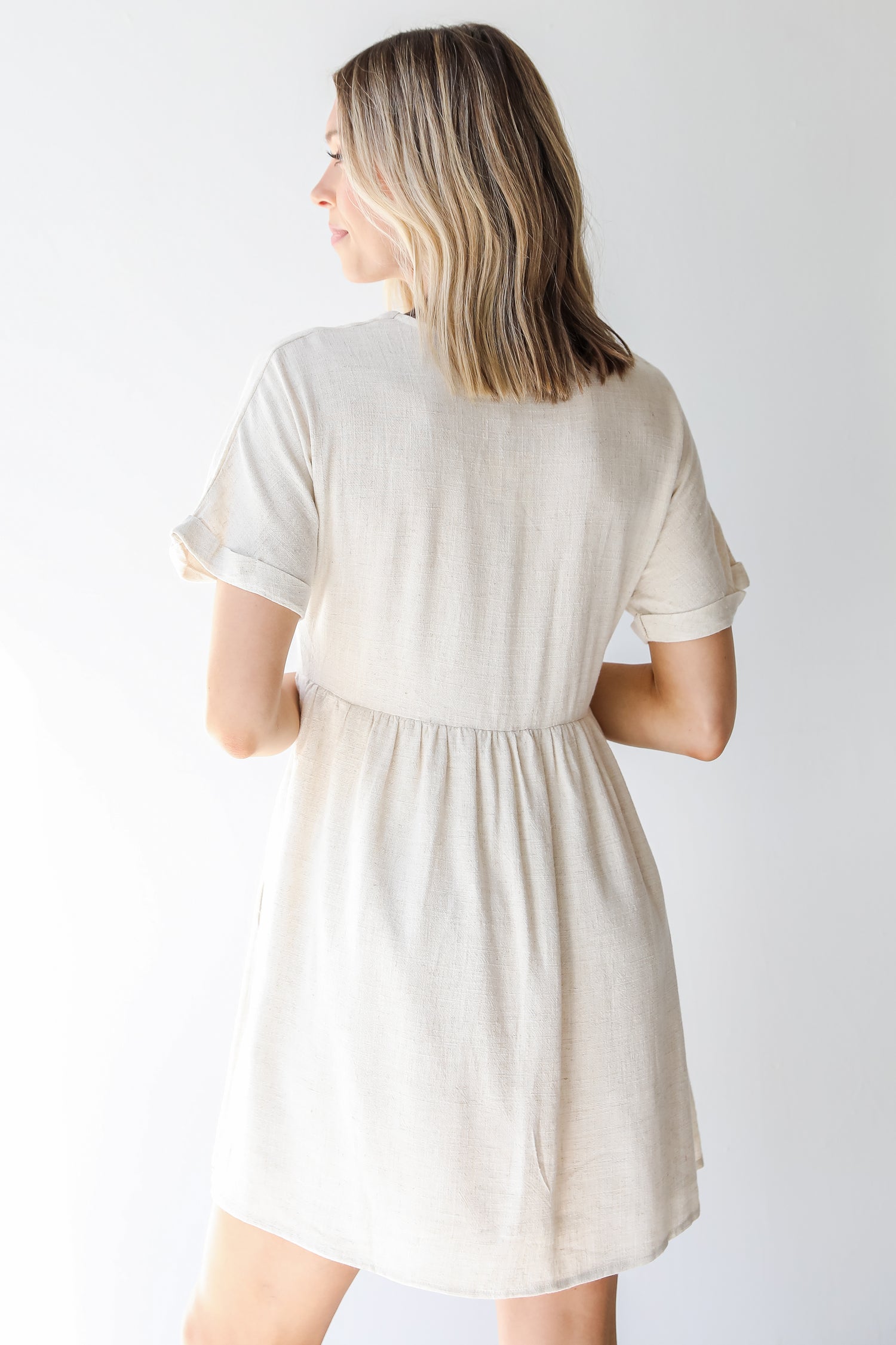 Linen Babydoll Dress in oatmeal back view