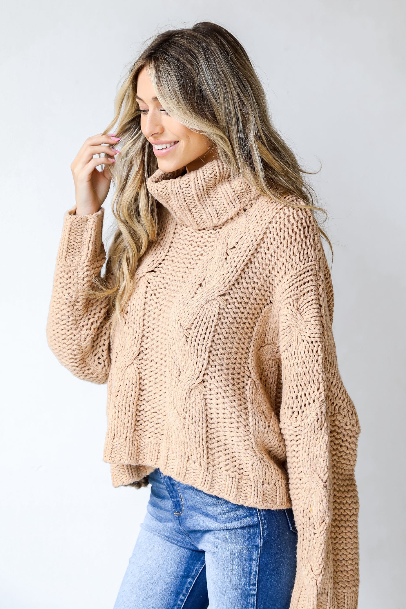 Cable Knit Turtleneck Sweater in taupe side view