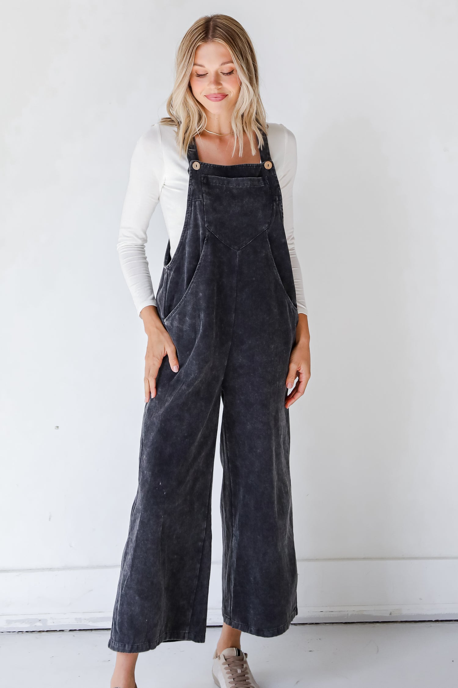 black velvet overalls on model