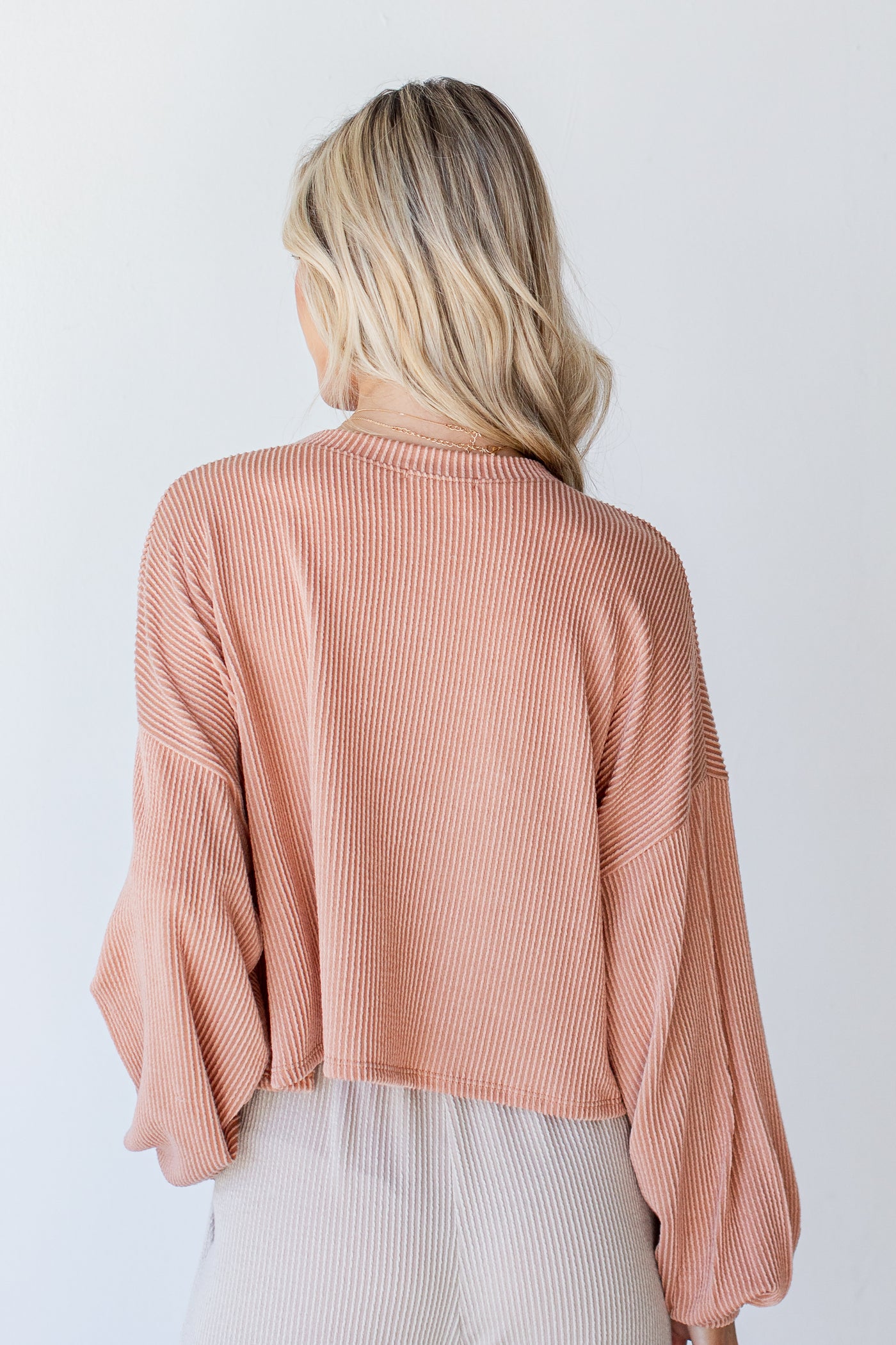 Cropped Corded Pullover in peach back view