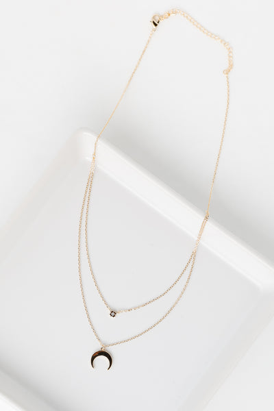 Gold Crescent Horn Layered Necklace flat lay
