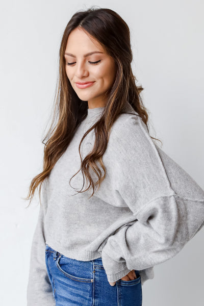 heather grey sweater side view