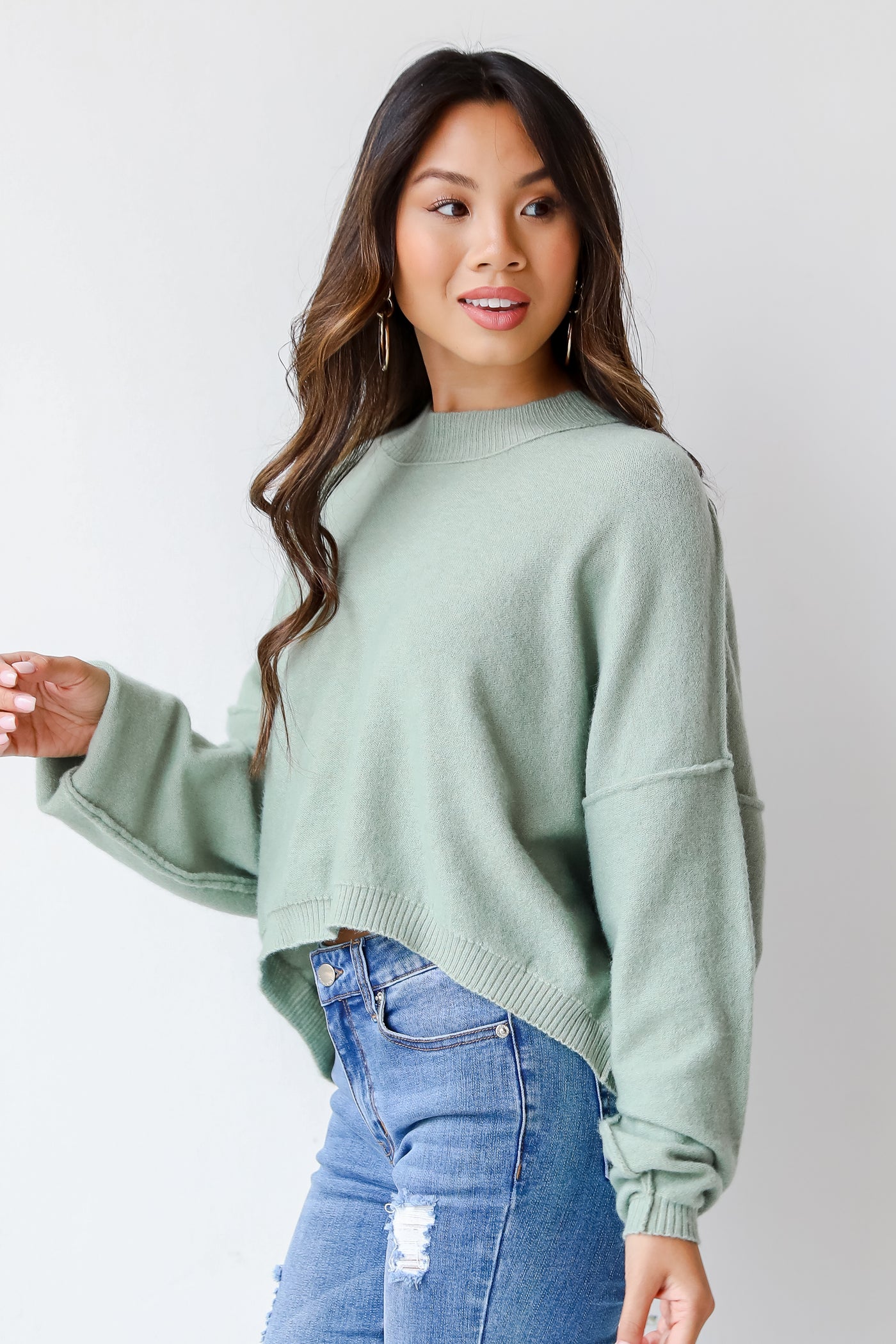 sage sweater side view