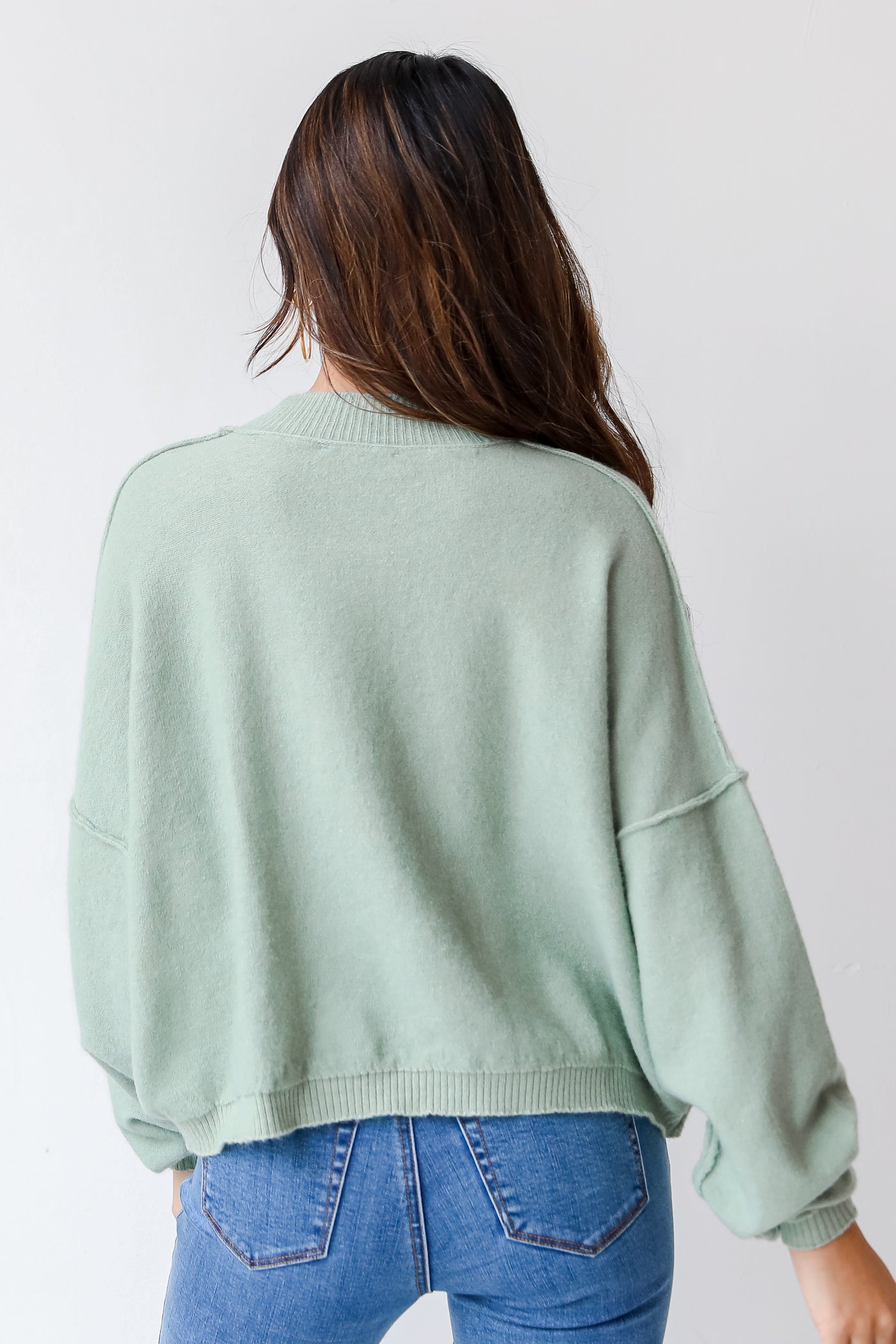 sage sweater back view