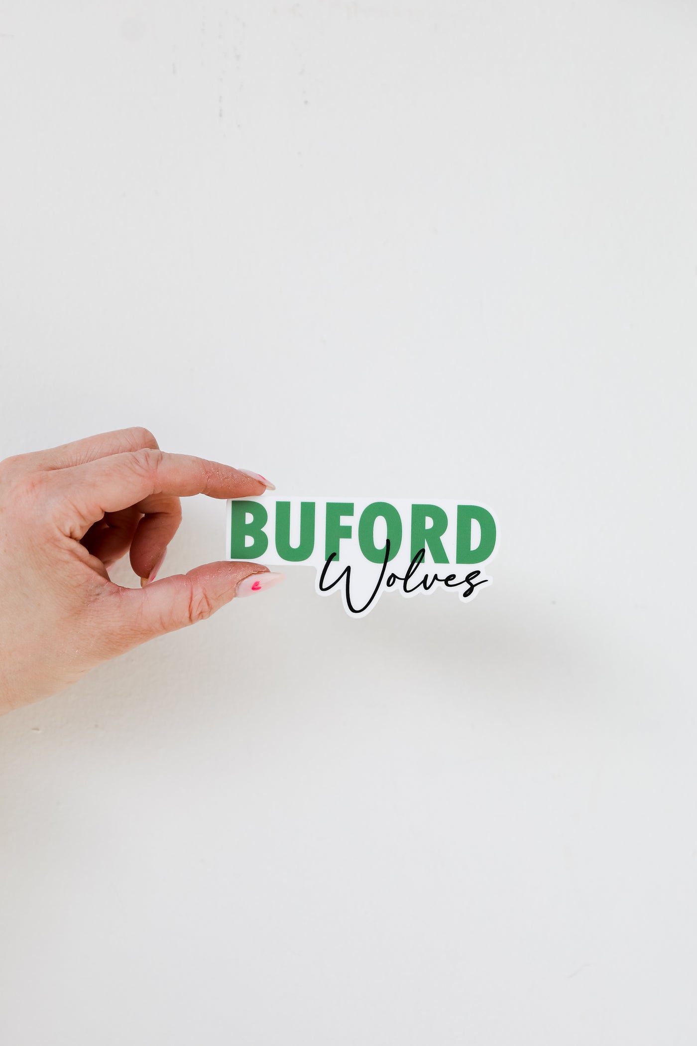 Buford Wolves Sticker flat lay
