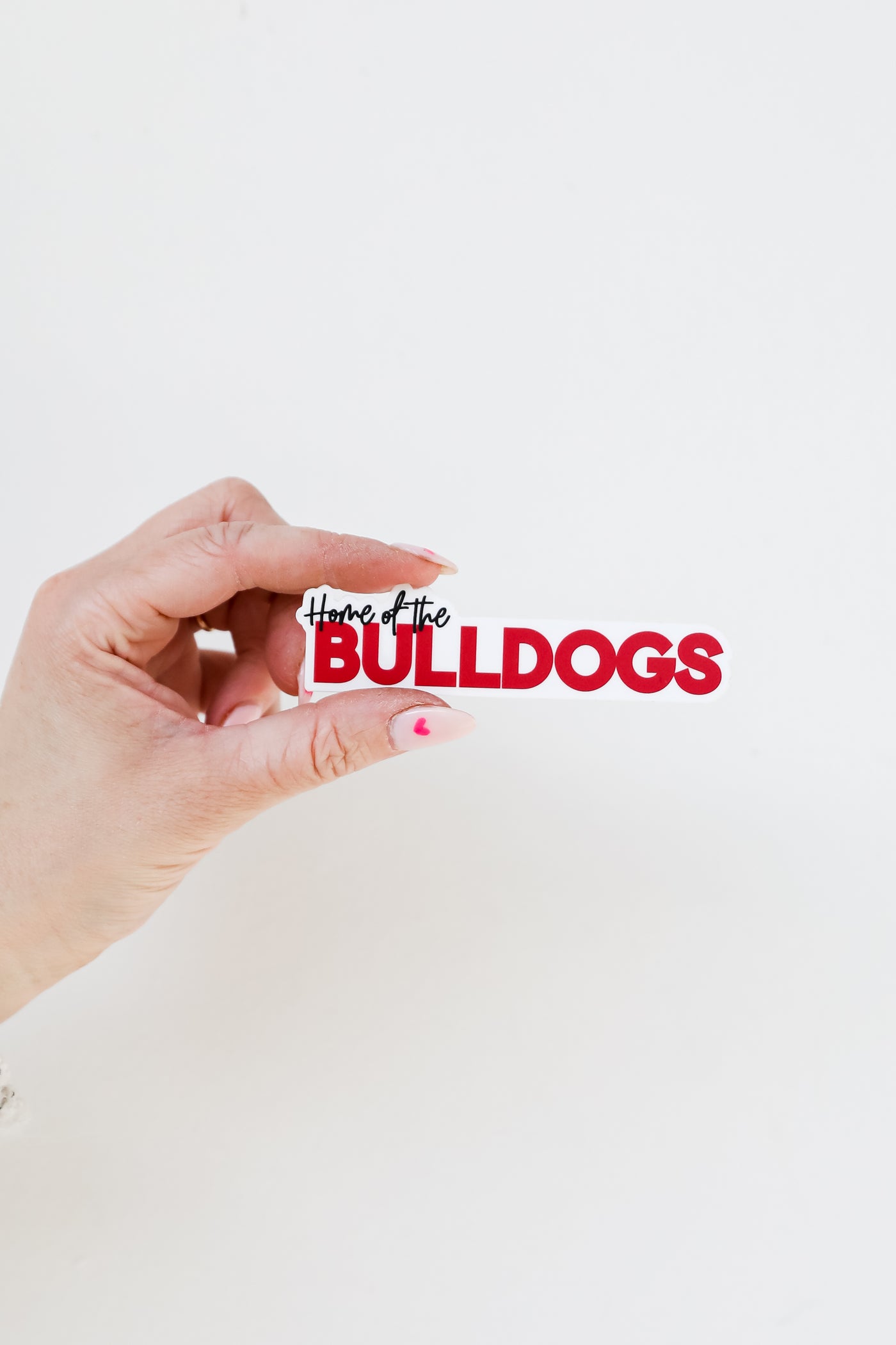 Home Of The Bulldogs Sticker flat lay