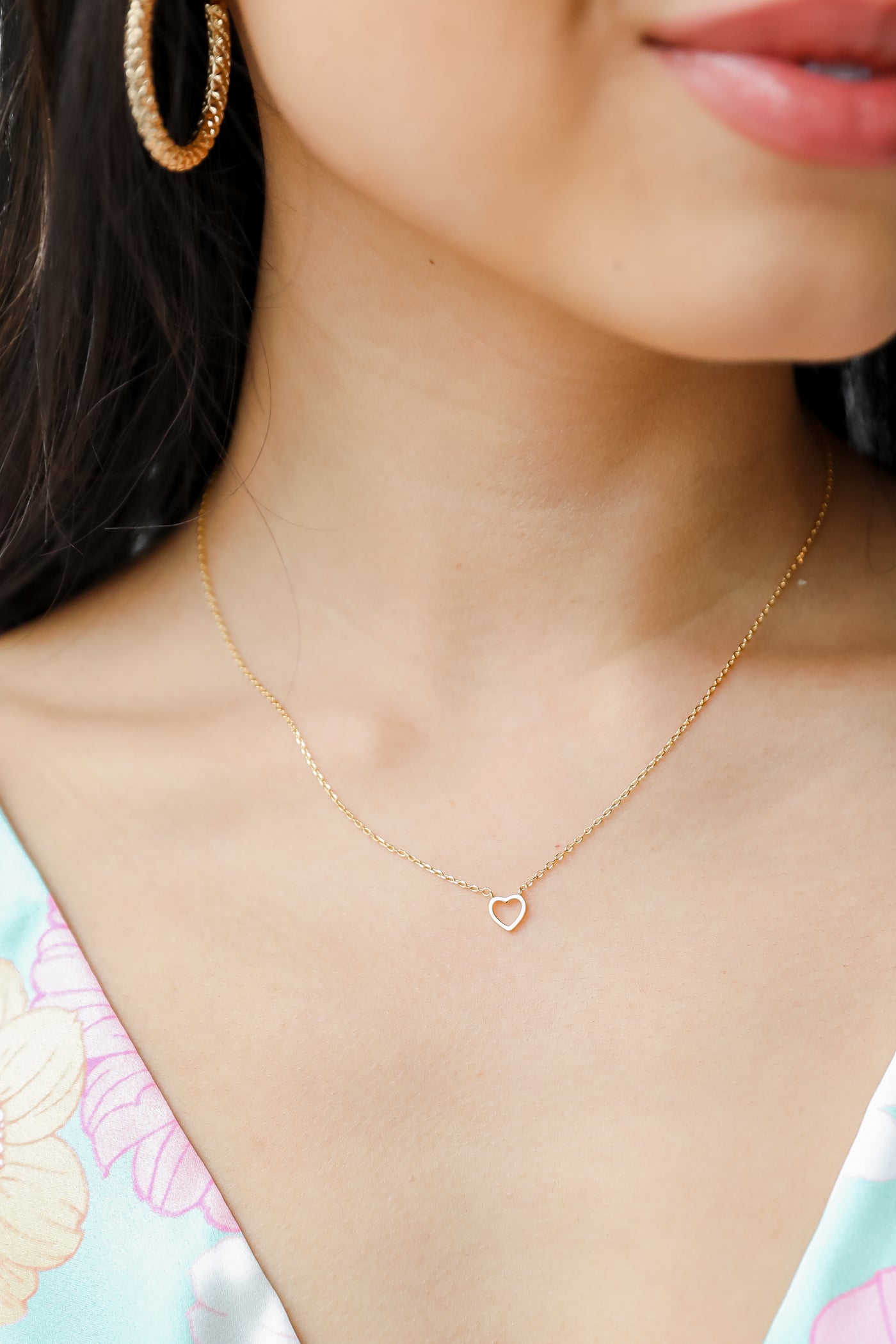 Gold Heart Charm Necklace on model
