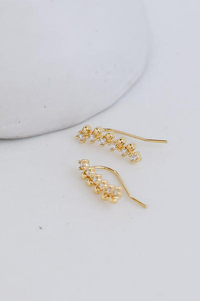 Gold Rhinestone Drop Earrings flat lay
