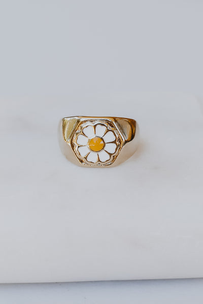 flat lay of a Gold Daisy Ring