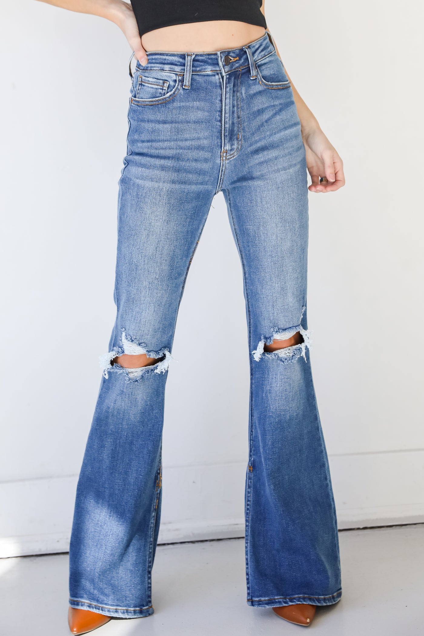 Distressed Flare Jeans on model