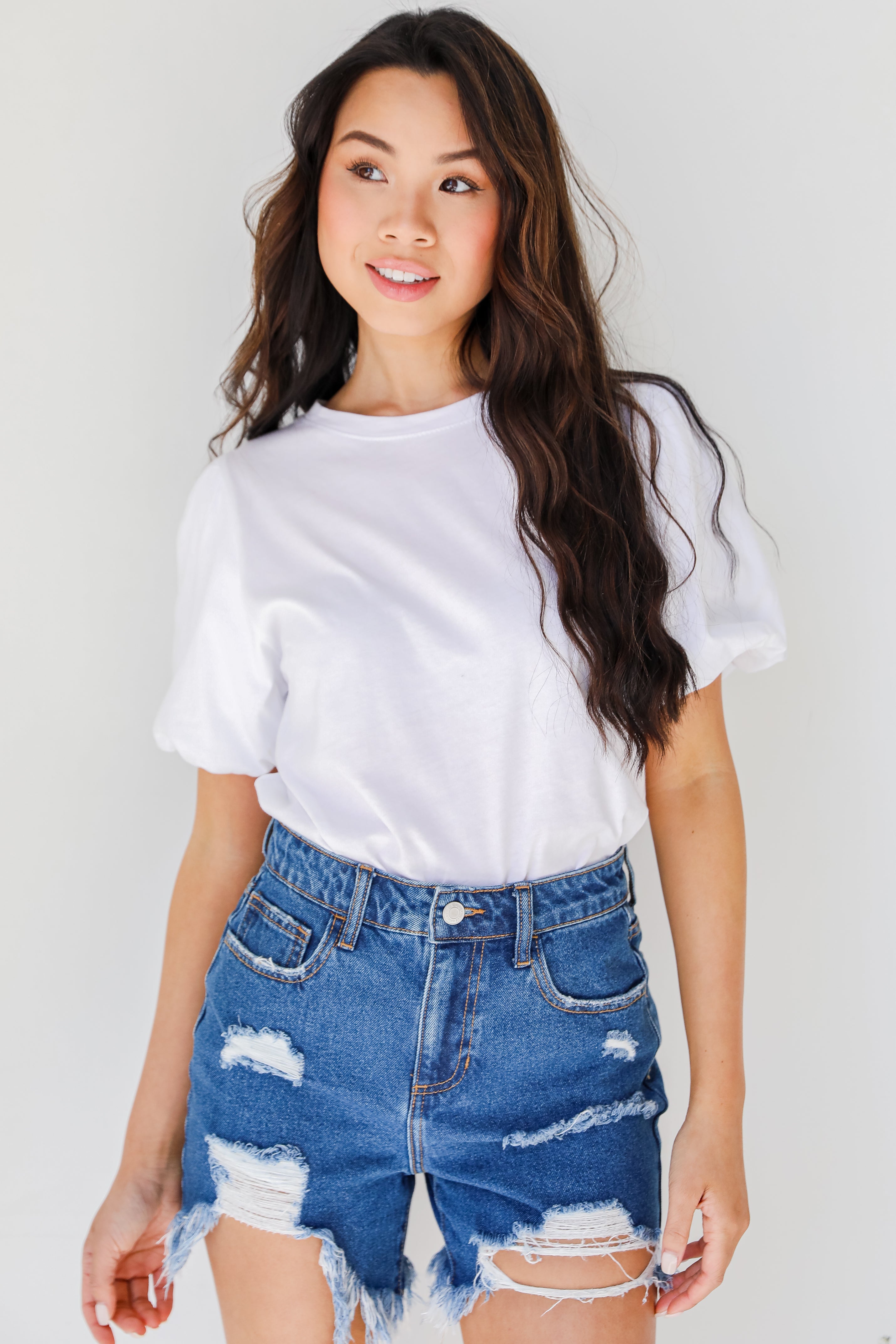 Distressed Denim Shorts on model