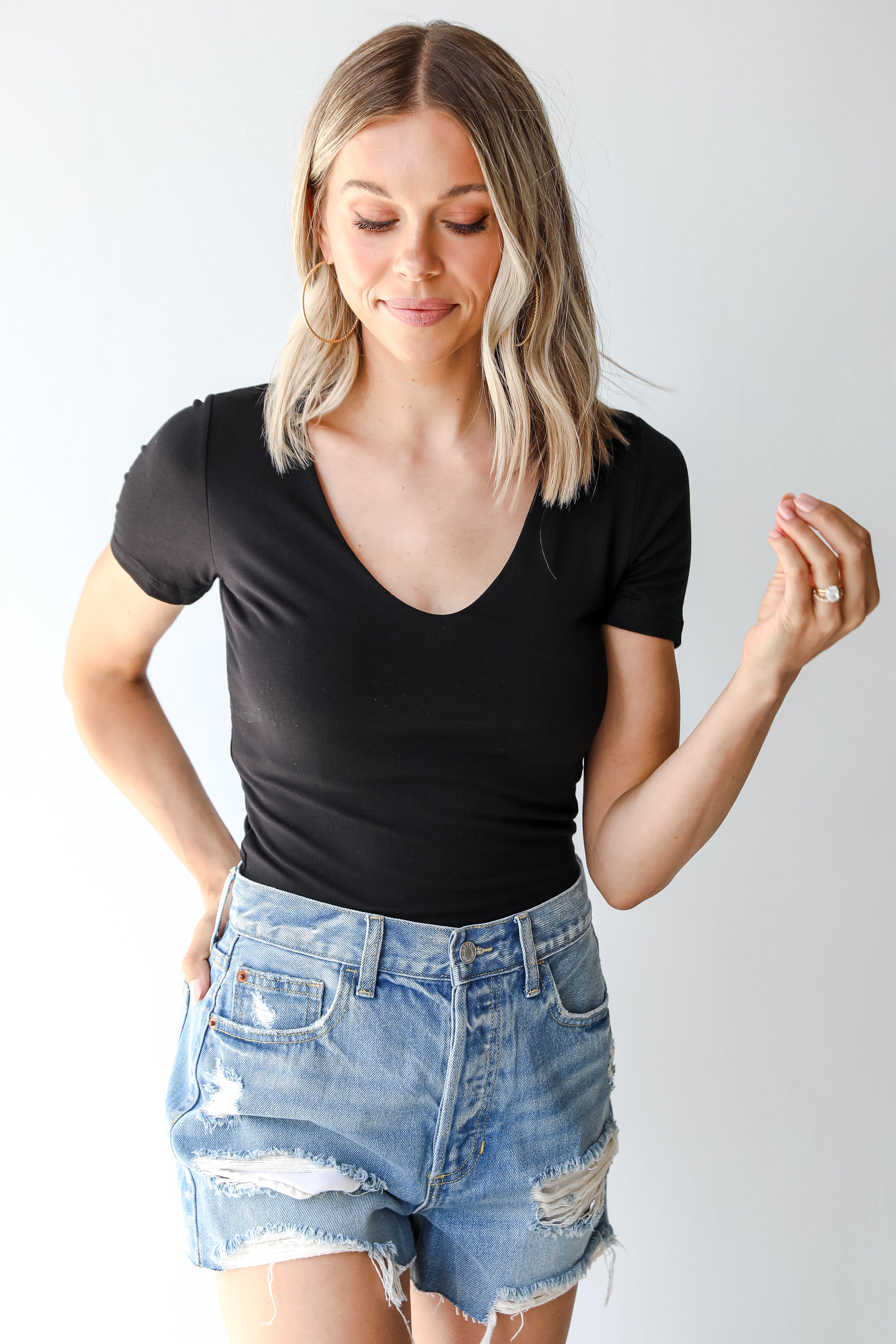 Distressed Denim Shorts on model