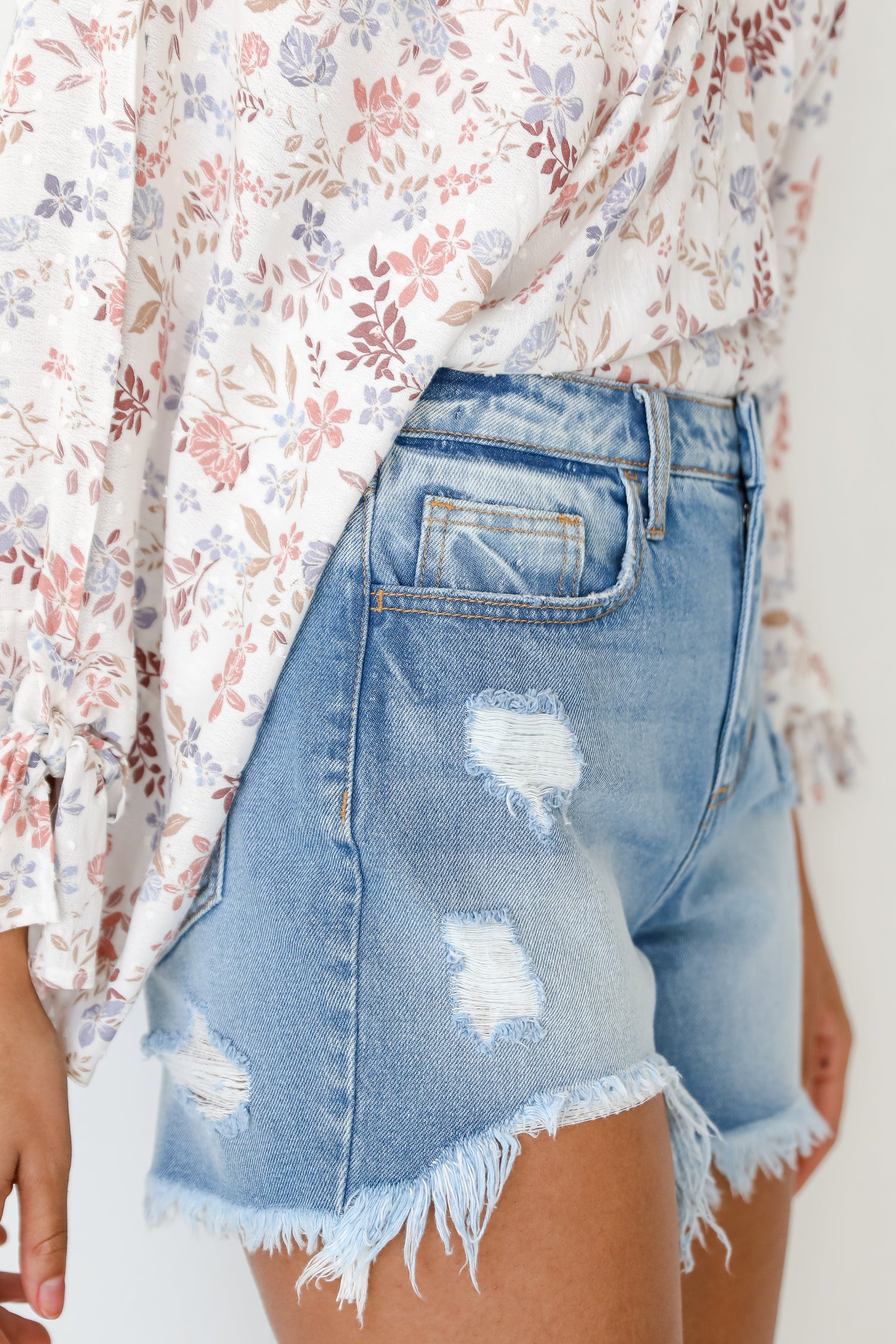 model wearing Distressed Denim Shorts