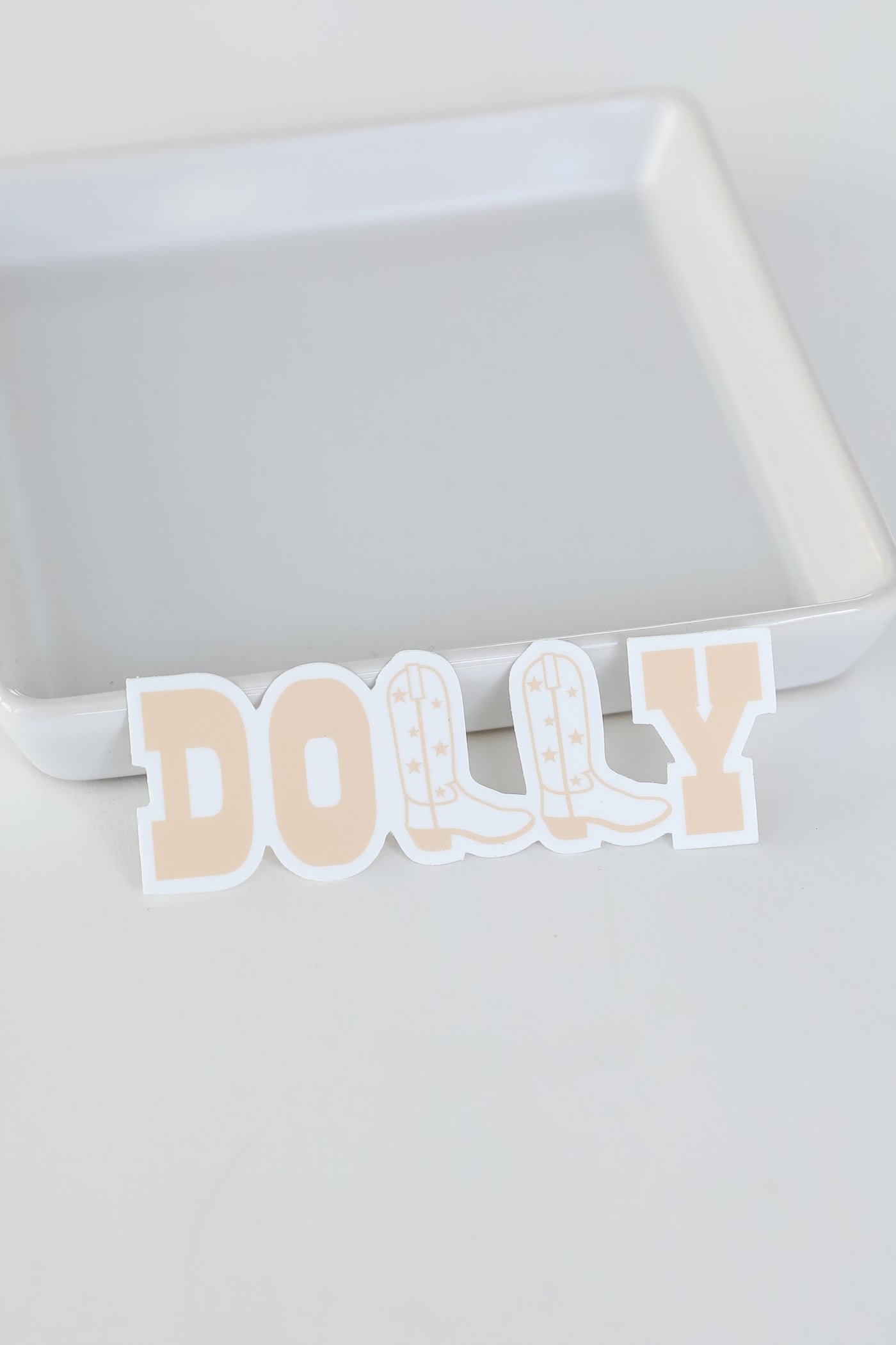 Dolly Boots Sticker in blush flat lay