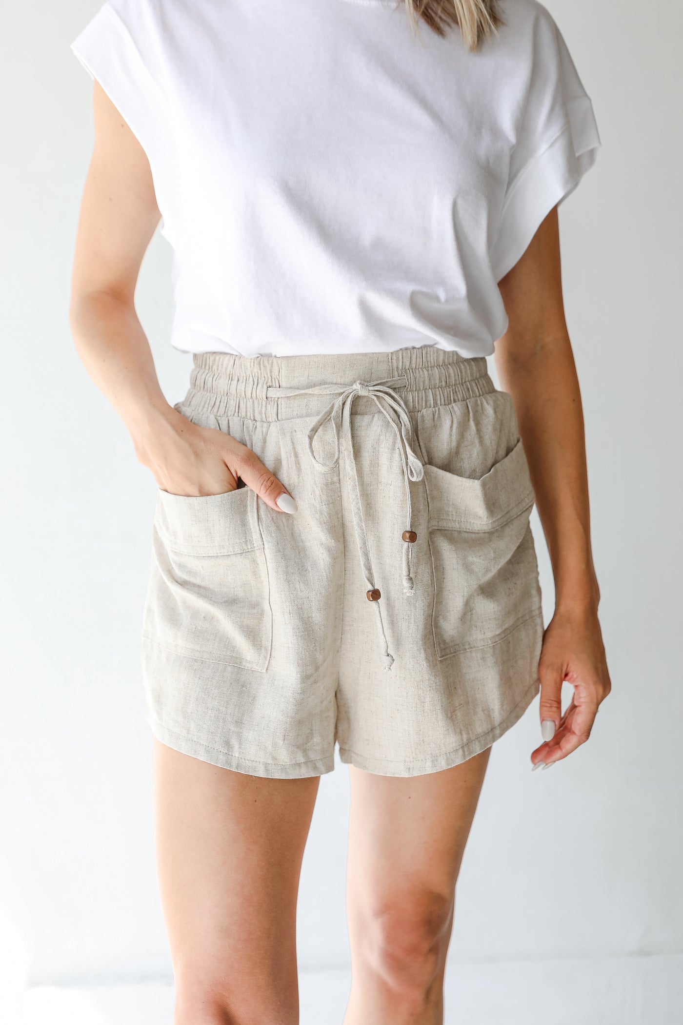 Linen Shorts in oatmeal on model