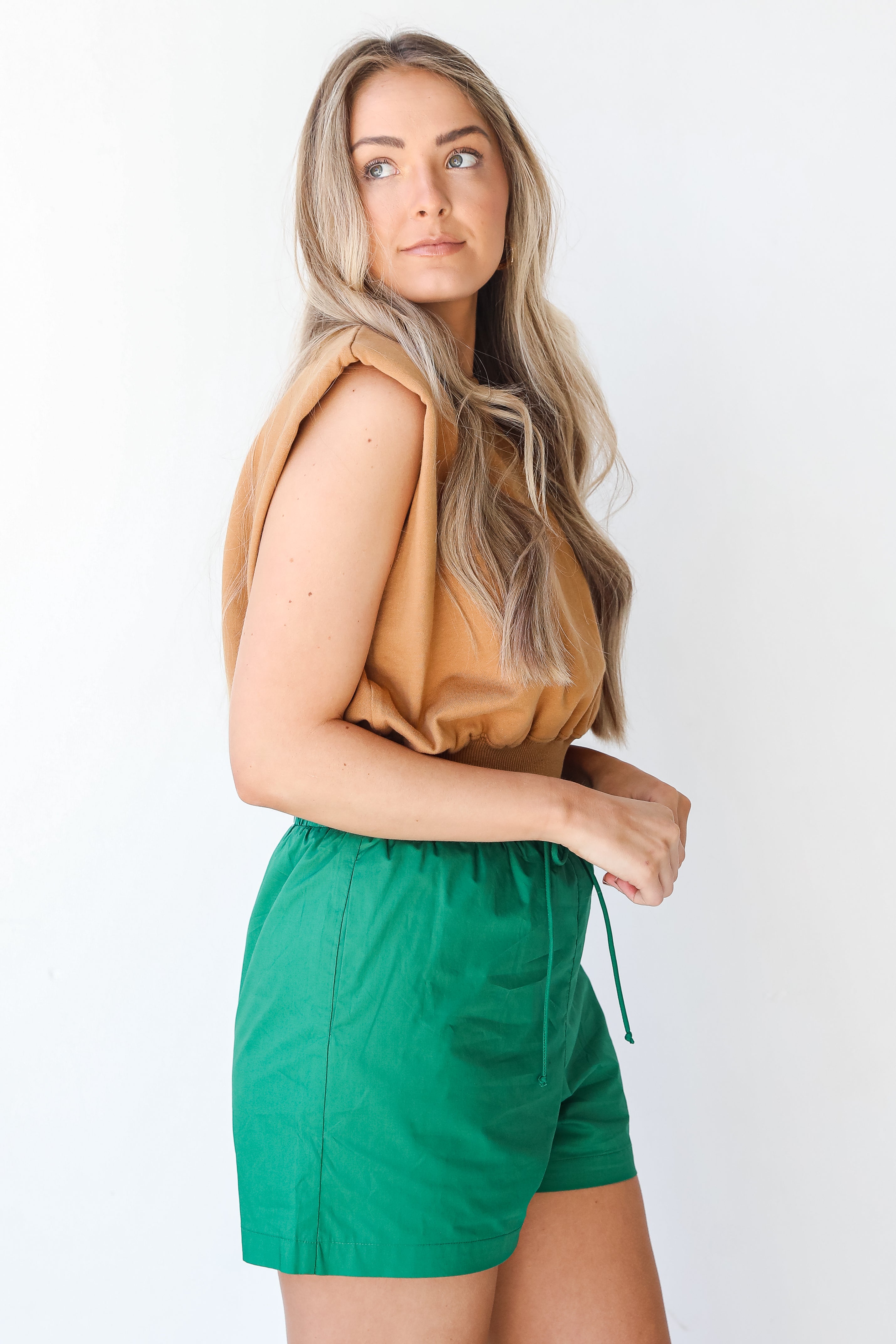 Shorts in green side view